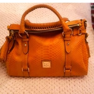 Snake embossed Dooney & Bourke